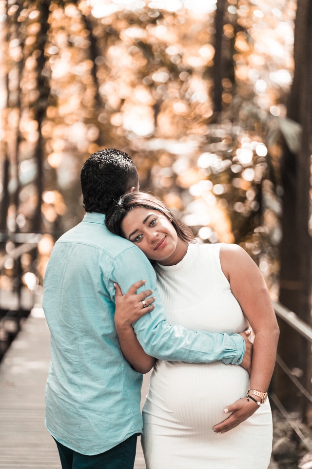 Couple waiting for results of pregnancy test kits